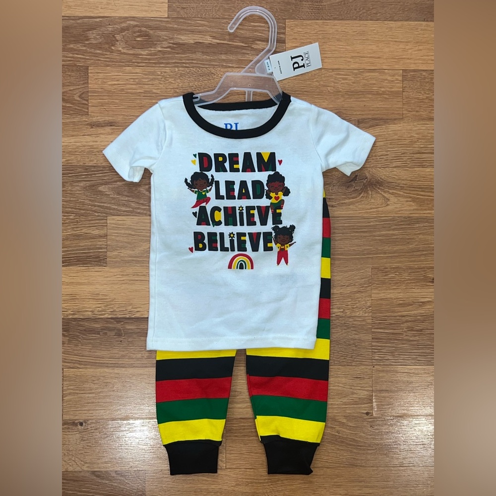 Kids Pajamas White Top with Black Trim and Multicolor Striped Pants